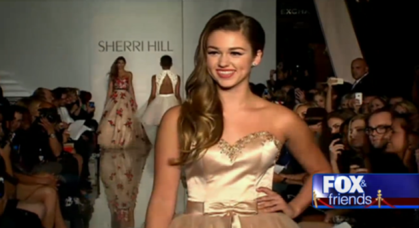 Sadie Robertson, the daughter of Willie and Kori Robertson of "Duck Dynasty" fame, walks down the runway in the Sherri Hill fashion show at Trump Tower during New York Fashion Week in New York City, N.Y., on Sept. 9, 2013.