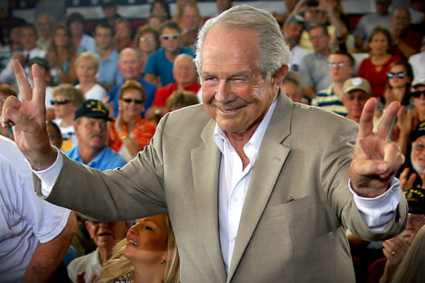 Evangelical Christian leader Pat Robertson takes his seat onstage ahead of a campaign rally with Republican presidential candidate and former Massachusetts Gov. Mitt Romney in Virginia Beach, Va., on Sept. 8, 2012.