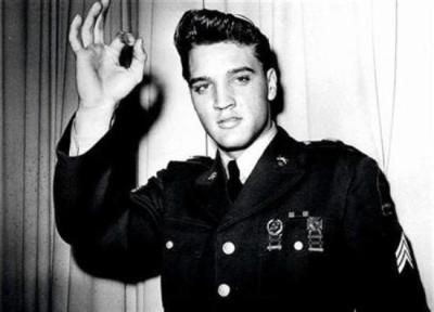 Elvis Presley is pictured in his United States Army uniform in this undated publicity photograph.