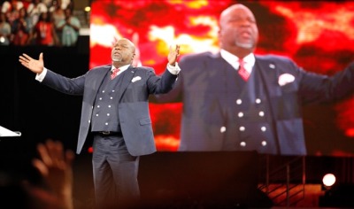 Bishop T.D. Jakes of The Potters House preaches about the trauma of making transitions in life at the Woman Thou Art Loosed conference at MegaFest on Aug. 30, 2013, in Dallas, Texas.