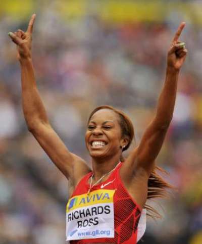 Sanya Richards-Ross celebrates after winning the women's 400m during the London Grand Prix, Diamond League, athletics meeting at Crystal Palace in London August 6, 2011.