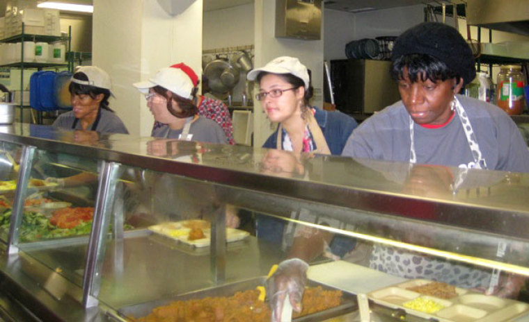 Lakewood Church mission volunteers serving fresh meals to the homeless at The Beacon in Houston, Texas, Sept. 21, 2013.