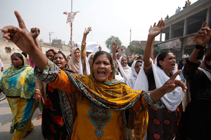 Members of the Pakistani Christian community chant slogans during a protest rally to condemn Sunday's suicide attack on a church in Peshawar September 23, 2013. A pair of suicide bombers blew themselves up outside the 130-year-old Anglican church in Pakistan after Sunday mass, killing at least 78 people in the deadliest attack on Christians in the predominantly Muslim country.