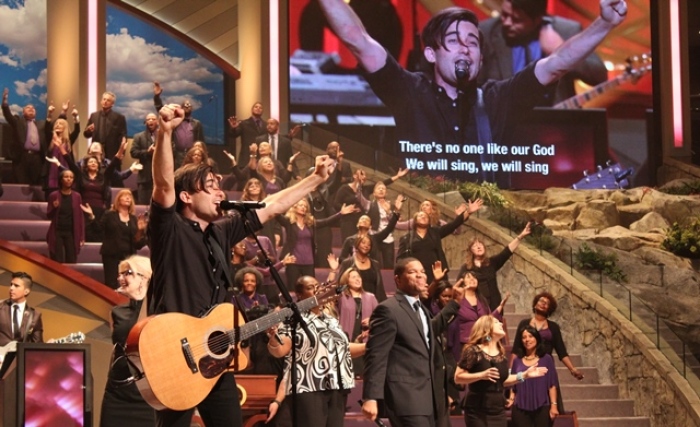 Contemporary Christian music artist Phil Wickham leads worship service at Lakewood Church in Houston, Texas, on Sept. 22, 2013.