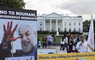 Iranian Americans protest against a conversation between U.S. President Barack Obama and new Iranian President Hassan Rouhani outside the White House in Washington D.C. on Sept. 28, 2013.