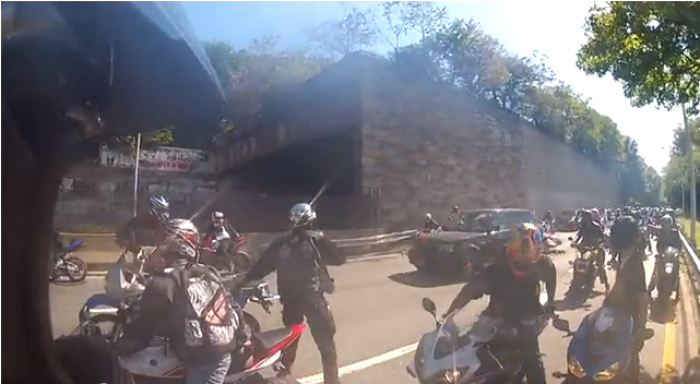A driver tries to get away from bikers in Manhattan, New York, after being attacked on the West Side Highway.
