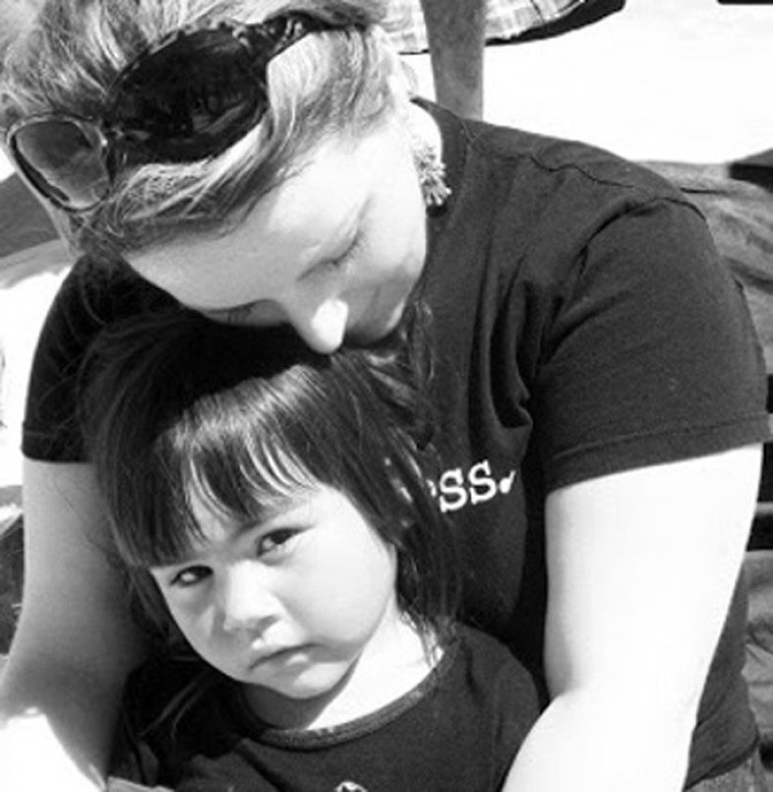 Jodie Mac Lean with child in Zone Kids, a Youth With A Mission (YWAM) program, [FILE]