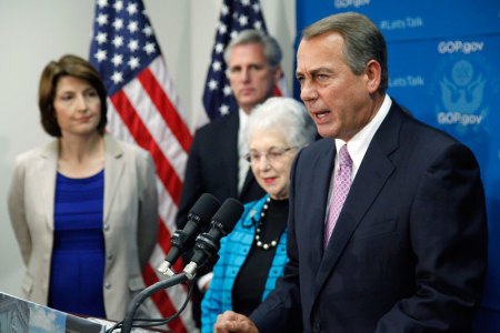 U.S. House Speaker John Boehner (R-OH) (R) shouts,