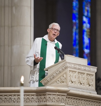 The Very Reverend Gary Hall, Tenth Dean of the Washington National Cathedral, preaching before the Cathedral's congregation in the District of Columbia.