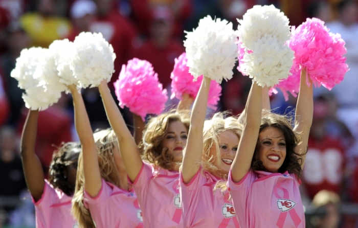 Kansas City Chiefs cheerleaders wear new pink outfits to promote Breast Cancer Awareness.
