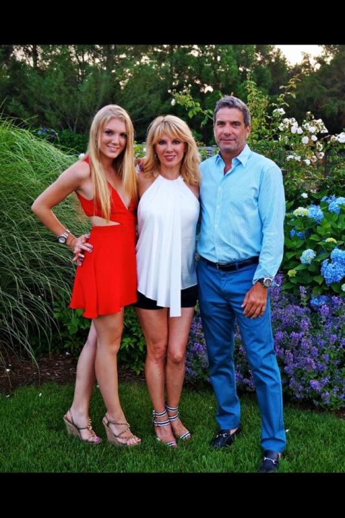 Ramona Singer poses alongside her husband Mario and daughter Avery