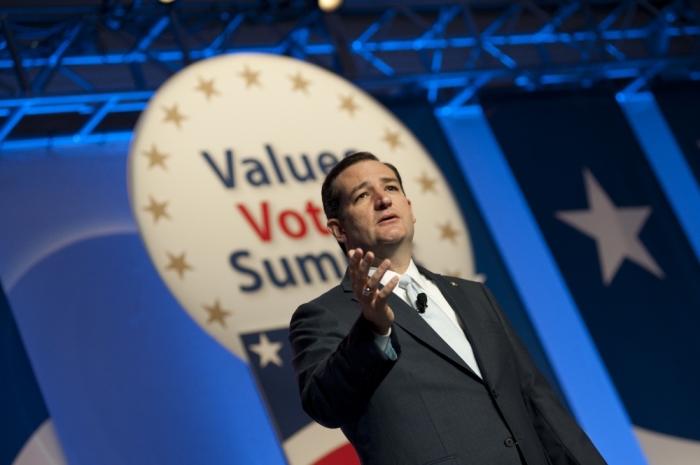 Senator Ted Cruz (R, TX) addresses conservatives and hecklers at the Values Voter Summit in Washington, DC. About two dozen protestors interrupted his speech, but the Senator continued unabashed.