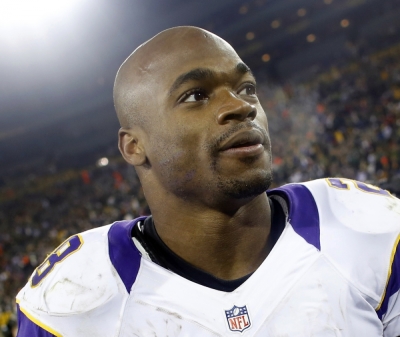 Minnesota Vikings running back Adrian Peterson (28) leaves the field in Green Bay, Wisconsin, January 5, 2013.