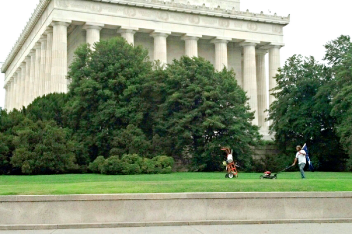 A private citizen mows the Lincoln Memorial lawn during the government shutdown.