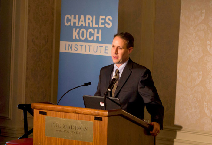 Tim Kane, chief economist at the Hudson Institute and co-author of 'Balance: The Economics of Great Powers from Ancient Rome to Modern America,' speaks at the Charles Koch Institute in Washington, D.C., on Thursday, Oct. 17, 2013.