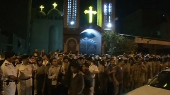Crowd outside Virgin Mary Church in Cairo, Egypt, following an attack on Oct. 20, 2013.