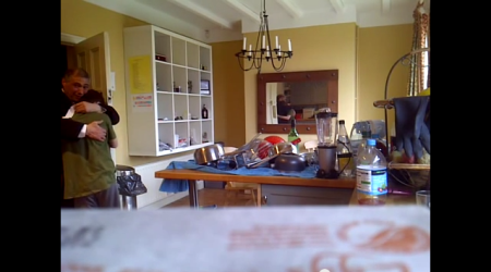 A British father congratulates his son for getting a 'C' on his national math exam.