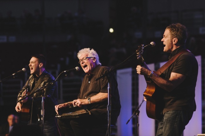 The worship group Malcolm and Alwyn perform during Tribute to Pastor Chuck [Smith] at Honda Center in Anaheim, Calif., Oct. 27, 2013.
