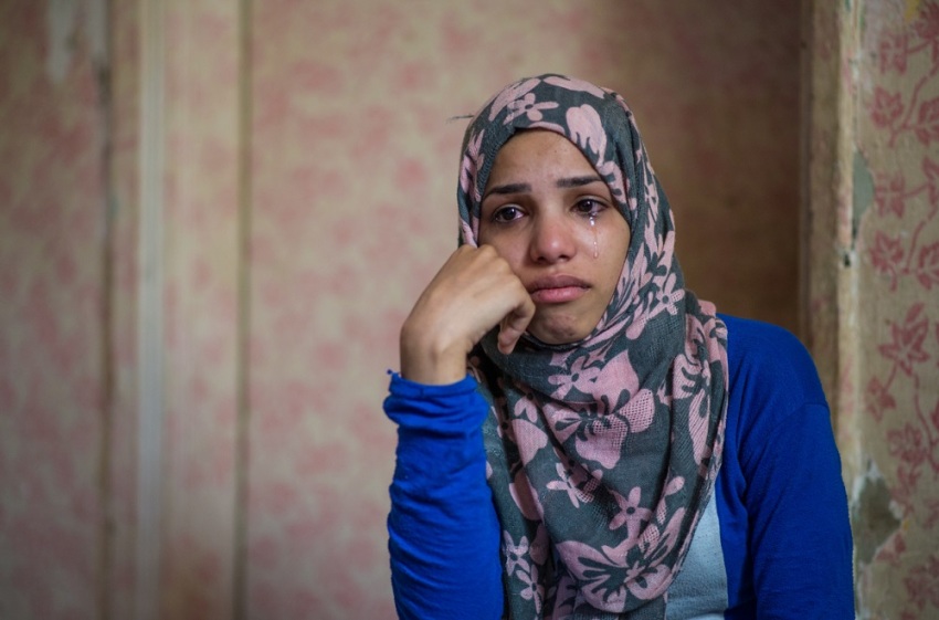 On the day of Israa's final exam, warring factions destroyed her school in Syria, shattering her way of life and dreams of earning a high school diploma. 