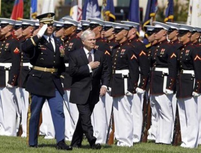 Retiring U.S. Defense Secretary Robert Gates inspects a military honor guard during his farewell ceremony at the Pentagon near Washington, D.C. on June 30, 2011.