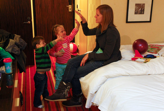 Jeana Bonner (R) plays with 5-year-old Jaymi Viktoria and 4-year-old Gabriel Artur (L) in a hotel room in Moscow, Russia, Feb. 11, 2013. After a nerve-wracking month in Moscow, fearing their adoption bids might be foiled by a diplomatic spat, two U.S. families are now able to take their adopted Russian children home. Bonner and Rebecca Preece spent around a year trying to adopt two Russian orphans, both with special needs, only for their applications to be stalled at the final stages when Russia banned Americans adopting in December. The ban was part of Russia's retaliation for U.S. sanctions on suspected human rights abusers and marked a low point for President Barack Obama's bid to improve relations with the former Cold War foe.