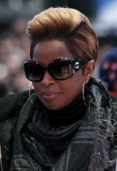 Singer Mary J. Blige attends activities including the Slam Dunk contest during the NBA All-Star weekend in Dallas, Texas February 13, 2010.