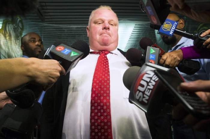 Toronto Mayor Rob Ford talks to reporters after admitting to smoking crack cocaine while being in a drunken stupor, the act of which has been circulated in a viral video.