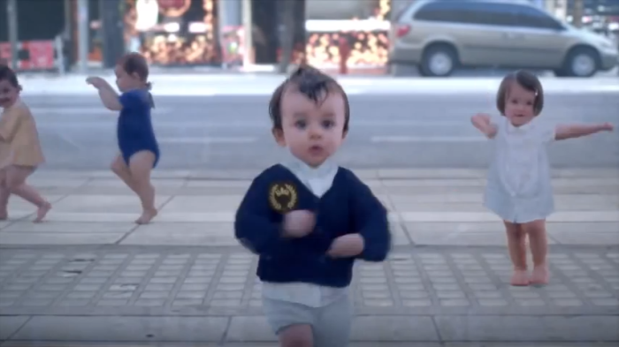 Babies dance in an Evian commercial.