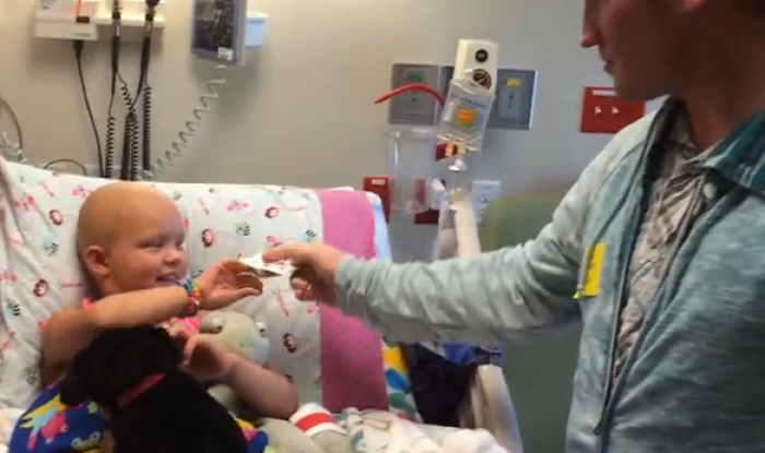 Magician brings cheer to children at the hospital.
