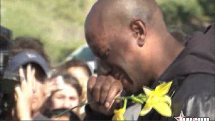 Actor and singer, Tyrese Gibson breaks down at the sight where his friend and fellow actor Paul Walker died in Valencia, Calif., on Saturday.