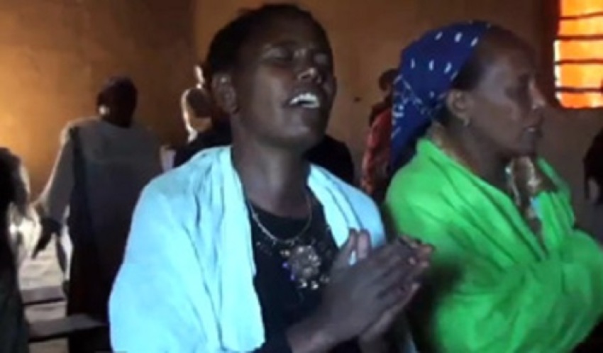 Members of a church plant in Ethiopia worship, [FILE]