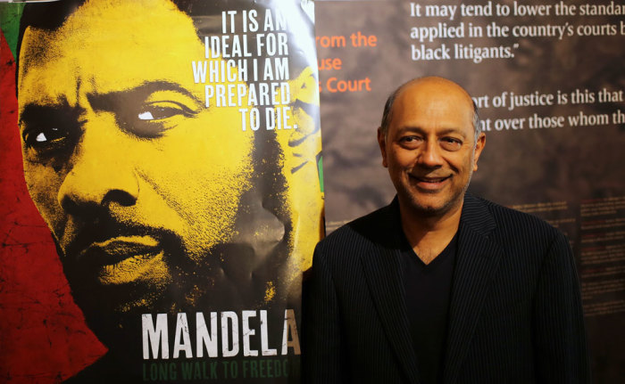 Film producer Anant Singh poses for photographs during the launch of the movie trailer of 'Mandela: Long Walk to Freedom' at the Nelson Mandela Centre of Memory in Johannesburg, September 17 2013.