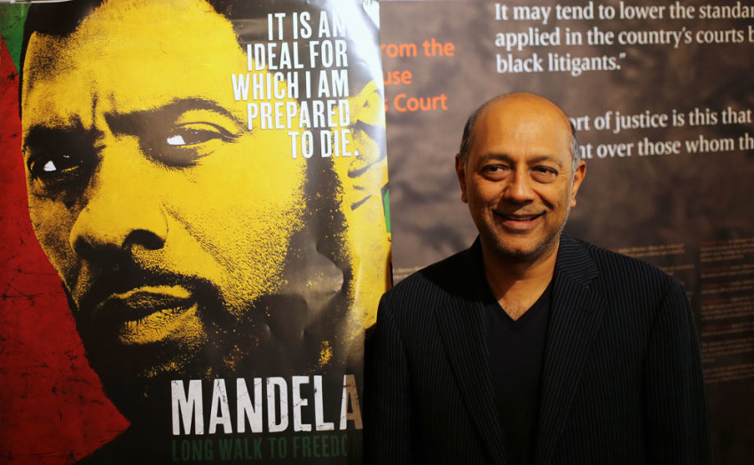 Film producer Anant Singh poses for photographs during the launch of the movie trailer of "Mandela: Long Walk to Freedom" at the Nelson Mandela Centre of Memory in Johannesburg, September 17 2013.