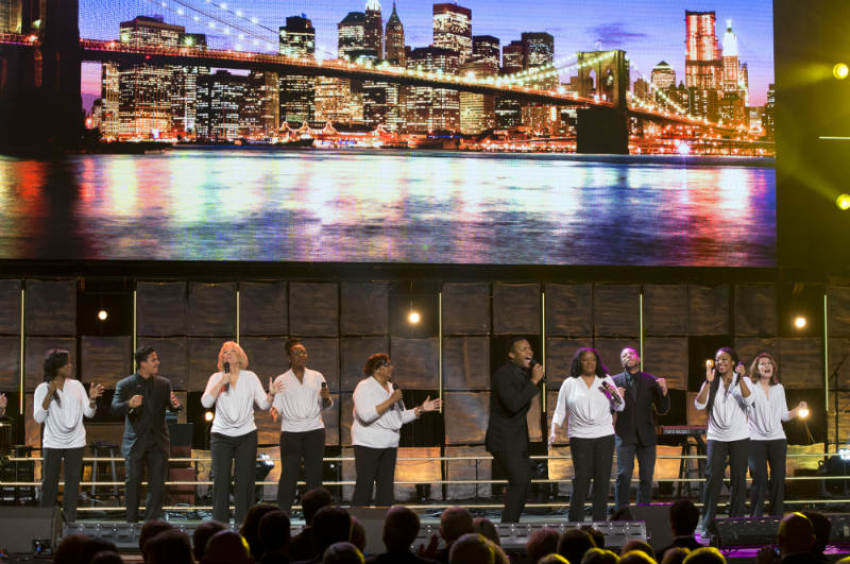 The Brooklyn Tabernacle Singers perform on stage at "A Night of Celebration in NYC with David Jeremiah & Friends" at Madison Square Garden on Thursday, Dec. 5, 2013.