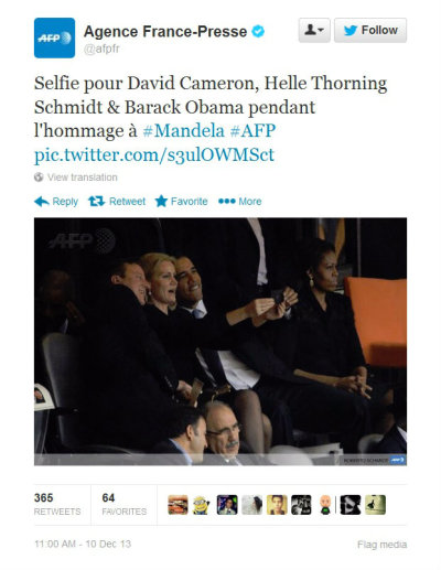 British Prime Minister David Cameron, Denmark's Prime Minister Helle Thorning Schmidt and U.S. President Barack Obama pose on Dec. 10, 2013, for a self-photograph during a tribute to the late Nelson Mandela in South Africa.