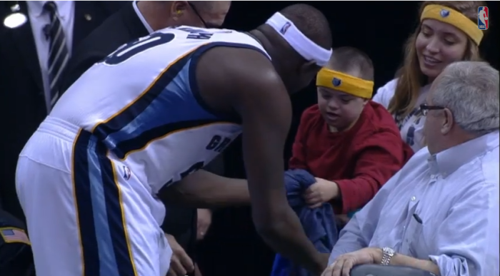 Zach Randolph of the NBA's Memphis Grizzlies gives a special needs fan his shirt on Wednesday.