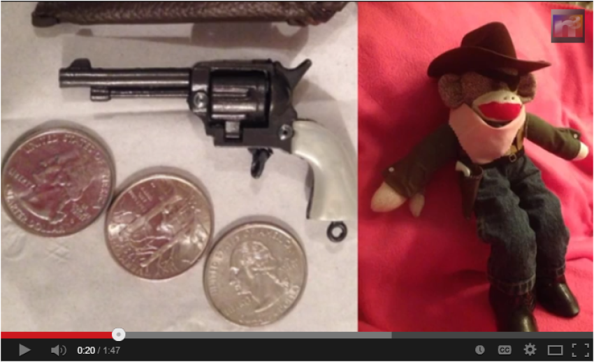 Rooster Monkburn (right), the sock monkey whose toy gun (left), was confiscated at the St. Louis, Mo., airport by a TSA official who insisted "this is a gun."