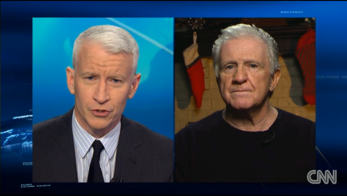 CNN's Anderson Cooper (l) and psychologist Dick Miller (r).