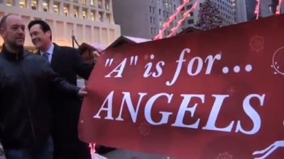 Remember America Foundation's 'A is for Angels' sign in Daley Plaza, Chicago covers up the Freedom From Religion Foundation's 'A is for Atheist' display.