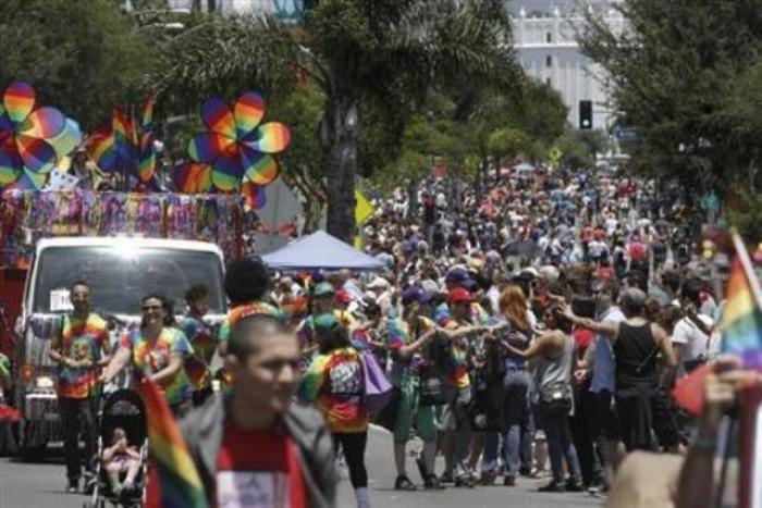 Crowds of revellers pack Santa Monica Blvd during the LA Pride parade in West Hollywood, Calif., June 10, 2012. The parade is part of the annual Los Angeles lesbian, gay, bisexual and transgender pride celebration in West Hollywood.