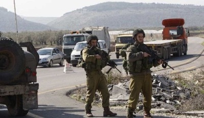 IDF soldiers at a checkpoint near the West Bank city of Jenin.