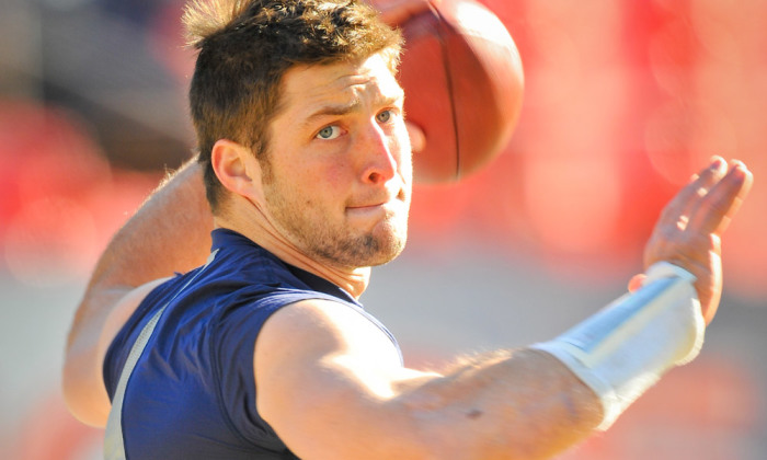 Credit : Former NFL quarterback Tim Tebow has signed a multiyear deal with ESPN to come on as an analyst for the SEC Network, the network announced on Dec. 31, 2013.