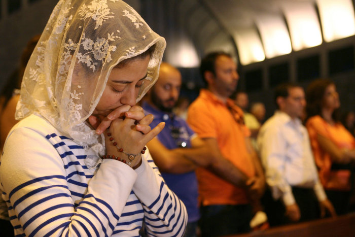 Lebanese and Syrian Christian Maronites pray for peace in Syria, in Harisa, Jounieh September 7, 2013.
