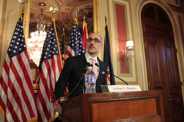 Arthur Brooks, President of the American Enterprise Institute, introduces U.S. Senator Marco Rubio (R, FL) for his speech on poverty alleviation for the 50th anniversary of President Lyndon Johnson's 'War on Poverty' speech at the U.S. Capitol on January 8, 2014.
