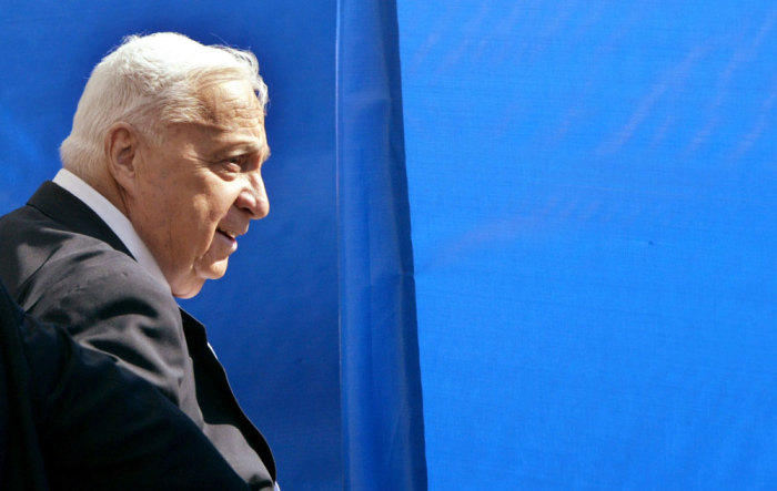 Israeli Prime Minister Ariel Sharon leaves the memorial ceremony for the first Prime Minister David Ben Gurion who passed away 32 years ago at Sde Boker in south of Israel December 7, 2005.