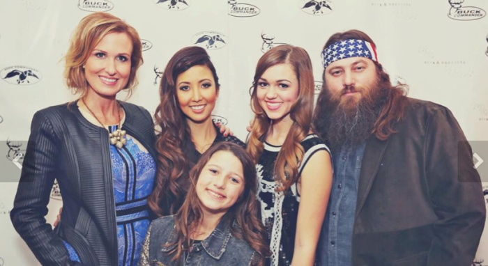 Korie and Willie Robertson with their daughters Rebecca, Sadie and Bella.