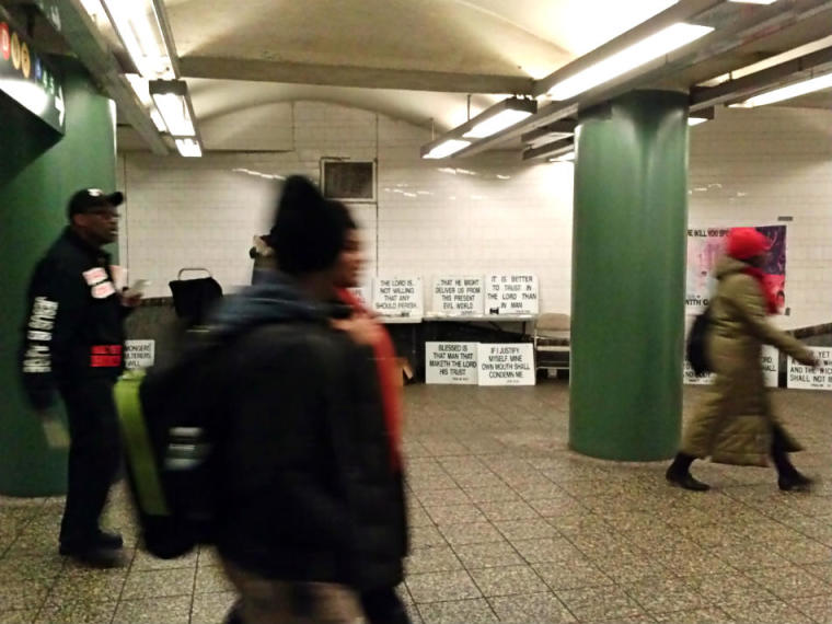 A man identifying himself as Brother Shawn preaches about salvation in Jesus Christ Friday, Jan. 10, 2014, at the Atlantic Terminal subway station in New York City.
