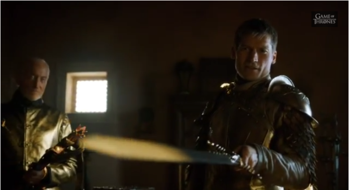 Jaime Lannister (Nikolaj Coster-Waldau) holds a melted sword at the audience in this still from the Game of Thrones Season 4 trailer.