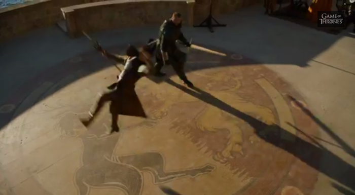 Oberyn Martell (Pedro Pascal) somersaults over Gregor Clegane (Ian Whyte) in this shot of their duel-to-come in the Game of Thrones Season 4 trailer.