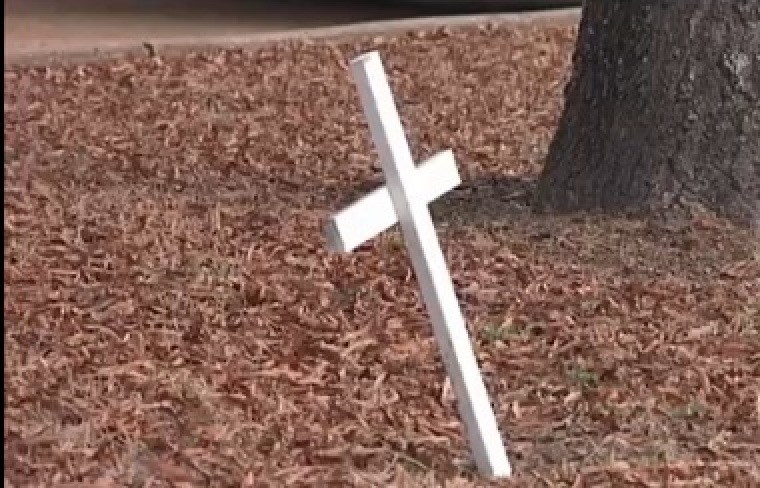 Small white cross in Searcy, Ark.